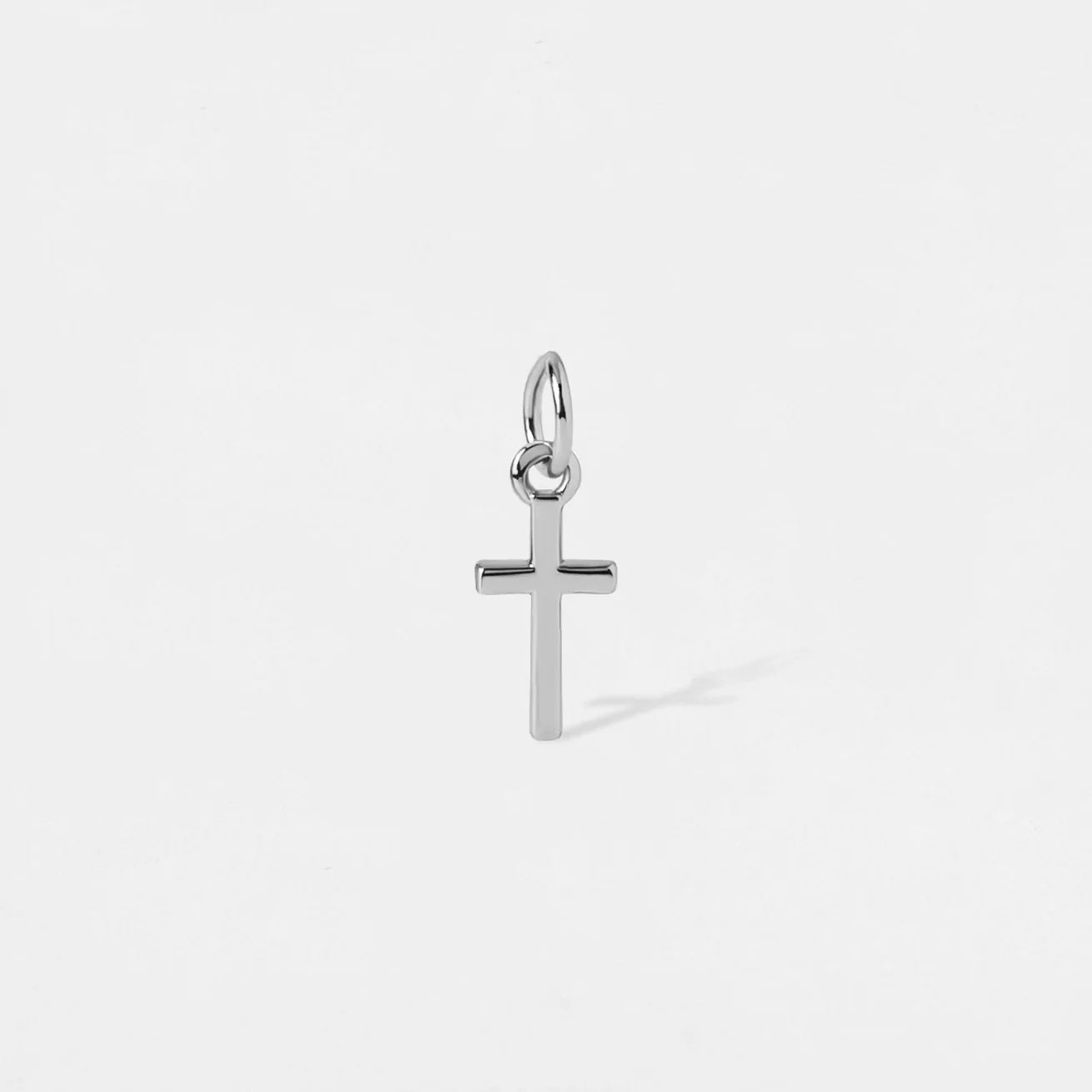 SMALL SOLID CROSS CHARM PENDANT